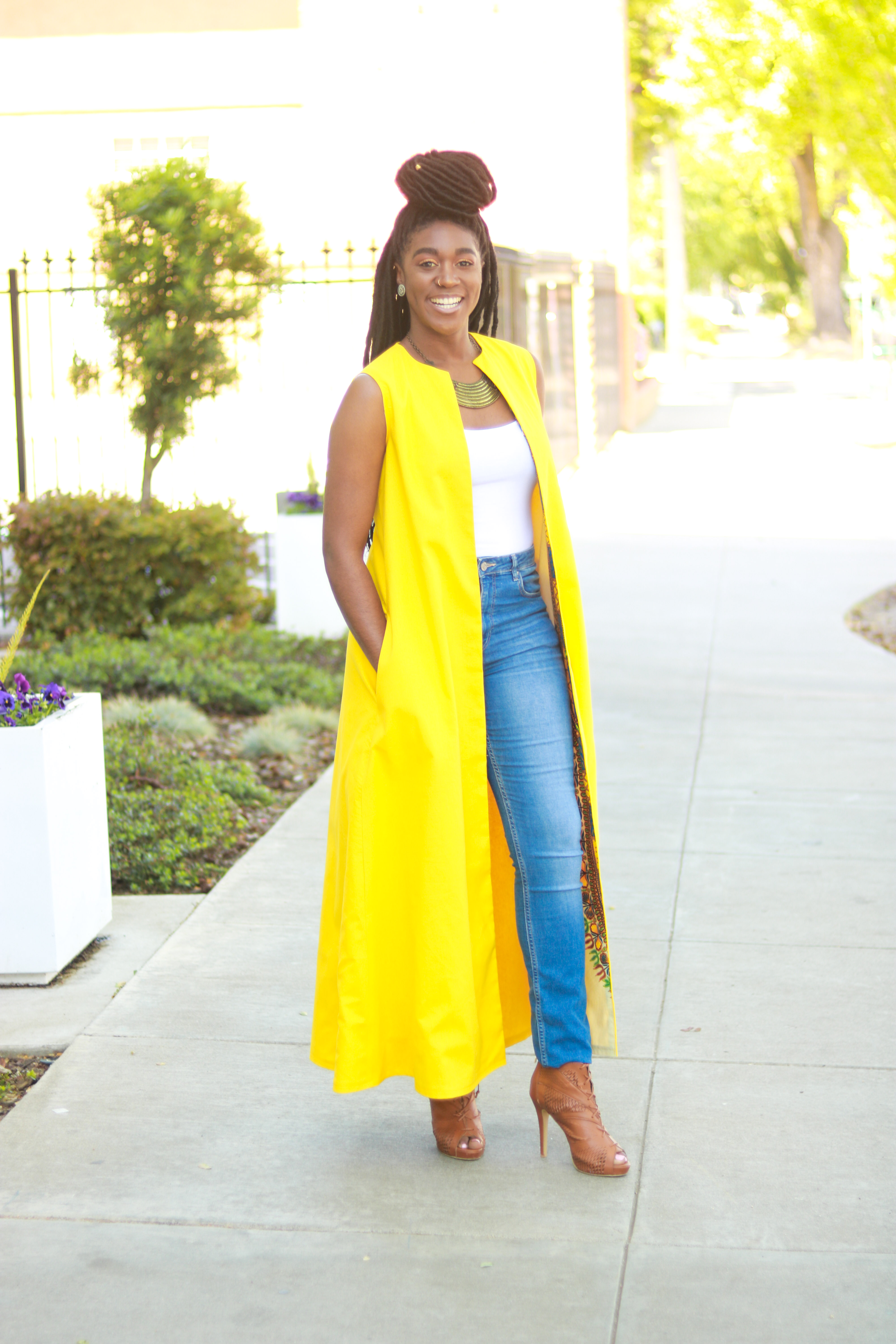 sleeveless duster with pockets